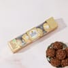 Shop Auspicious Floral Rakhi with Baklava Hamper