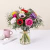 Bouquet of anemones and buttercups Online
