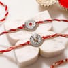 Gift Ganesh Divine Rakhi and Sweets Hamper