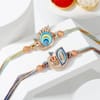 Gift Peacock Charm Rakhi and Dry Fruits Hamper