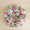 Small premium funeral wreath in shades of pink Online