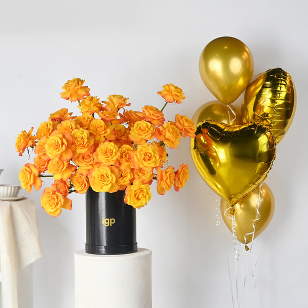 Charming Orange Roses And Balloons Arrangement
