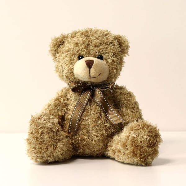 Pastel bloom and teddy bear